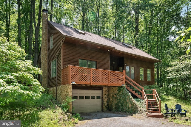 448 Newton Dr, Linden, VA 22642 - rustic home featuring a garage, a chimney, asphalt driveway, stairs, and a shingled roof