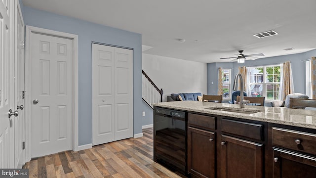 3073 Goshen Dr Unit M55L, Pennsburg, PA 18073 - kitchen with a sink, wine cooler, dark brown cabinets, light wood-style floors, and ceiling fan