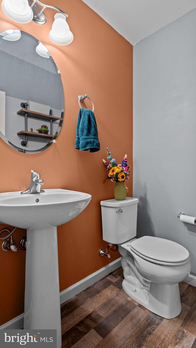 3073 Goshen Dr Unit M55L, Pennsburg, PA 18073 - half bath with toilet, wood finished floors, and baseboards