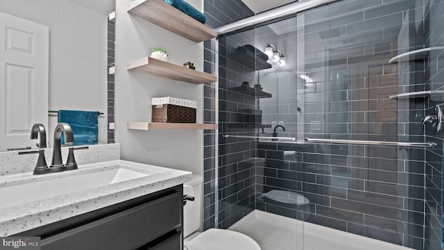 3073 Goshen Dr Unit M55L, Pennsburg, PA 18073 - bathroom featuring a stall shower, vanity, and toilet