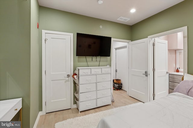 528 S 5th St Unit 1F, Philadelphia, PA 19147 - bedroom with light wood-style flooring, recessed lighting, and baseboards