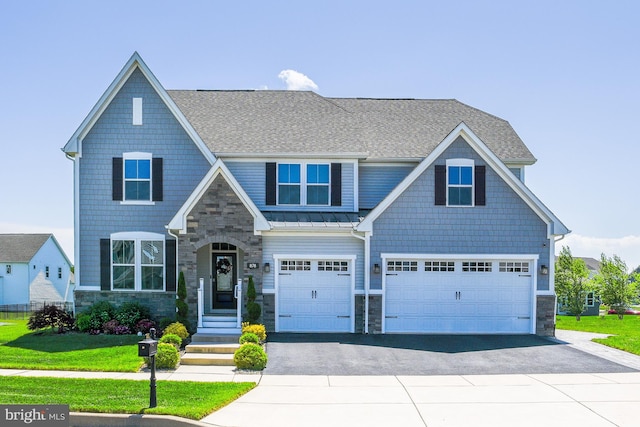 878 Sweet Birch Dr, Middletown, DE 19709 - craftsman inspired home with stone siding, asphalt driveway, roof with shingles, and a garage