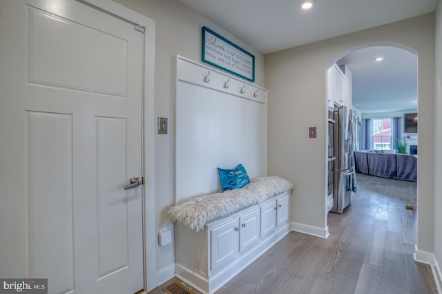 878 Sweet Birch Dr, Middletown, DE 19709 - mudroom with arched walkways, wood finished floors, recessed lighting, and baseboards