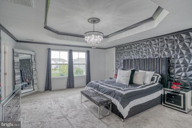 878 Sweet Birch Dr, Middletown, DE 19709 - carpeted bedroom featuring ornamental molding, a tray ceiling, a chandelier, and baseboards