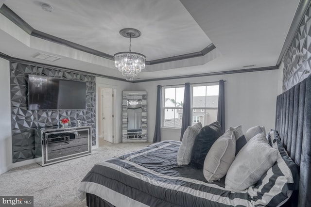 878 Sweet Birch Dr, Middletown, DE 19709 - carpeted bedroom with a tray ceiling, ornamental molding, a chandelier, and baseboards