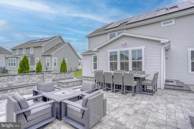 878 Sweet Birch Dr, Middletown, DE 19709 - view of patio featuring outdoor dining area and an outdoor fire pit