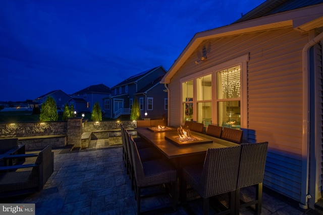 878 Sweet Birch Dr, Middletown, DE 19709 - patio at night with a patio and a fire pit