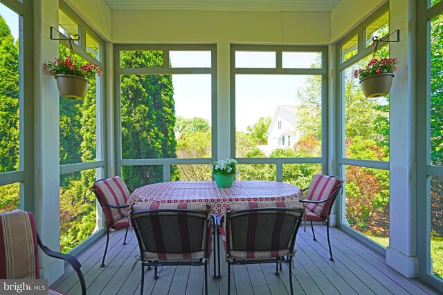322 Captains Cir, Lewes, DE 19958 - sunroom / solarium featuring a wooden deck, wood-type flooring, and healthy amount of natural light