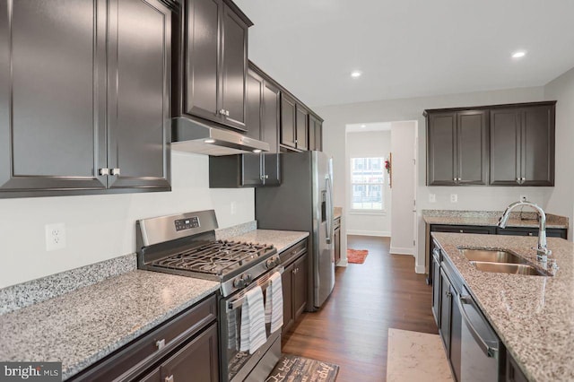 2005 Benjamin Ct, Harrisburg, PA 17110 - kitchen with stainless steel appliances, under cabinet range hood, dark wood-style floors, light stone countertops, and recessed lighting