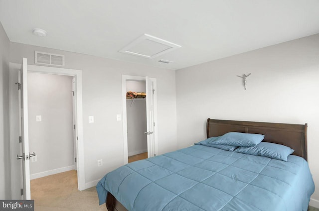 2005 Benjamin Ct, Harrisburg, PA 17110 - bedroom with attic access, light carpet, a spacious closet, and a closet