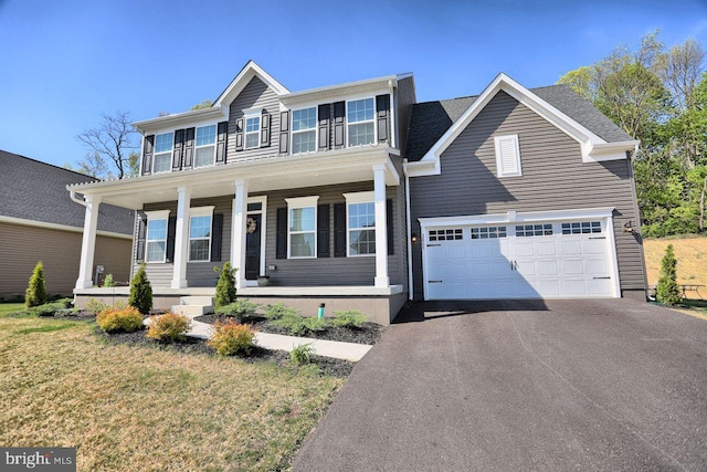 2005 Benjamin Ct, Harrisburg, PA 17110 - view of front of house featuring covered porch, asphalt driveway, and a front lawn
