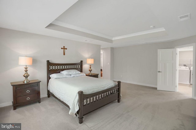 2005 Benjamin Ct, Harrisburg, PA 17110 - carpeted bedroom featuring a tray ceiling and separate washer and dryer
