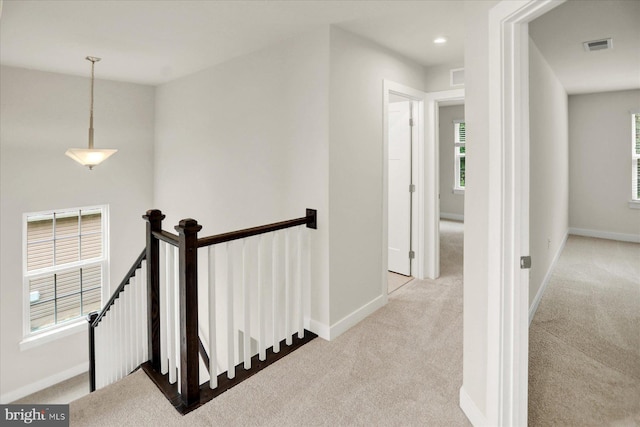 2005 Benjamin Ct, Harrisburg, PA 17110 - hall with an upstairs landing, carpet floors, and healthy amount of natural light