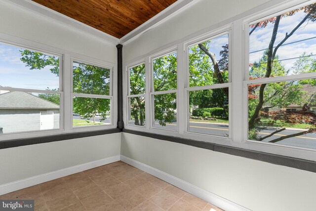 503 W Park Ave, Hamilton, NJ 08610 - unfurnished sunroom with wood ceiling, tile patterned flooring, baseboards, and ornamental molding