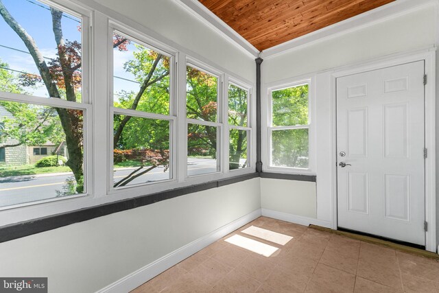 503 W Park Ave, Hamilton, NJ 08610 - unfurnished sunroom with wood ceiling, plenty of natural light, tile patterned floors, and baseboards