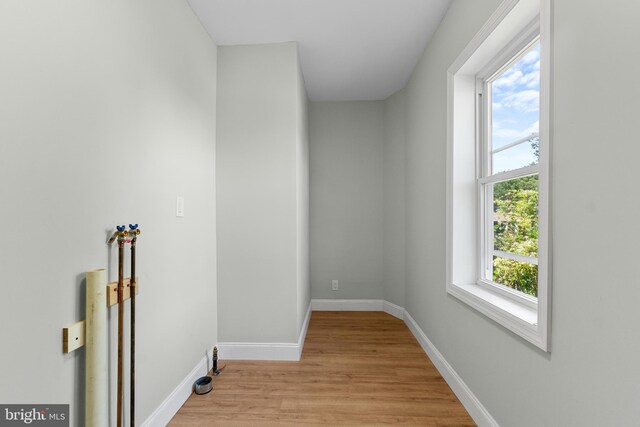 503 W Park Ave, Hamilton, NJ 08610 - laundry room featuring light wood-style floors and baseboards