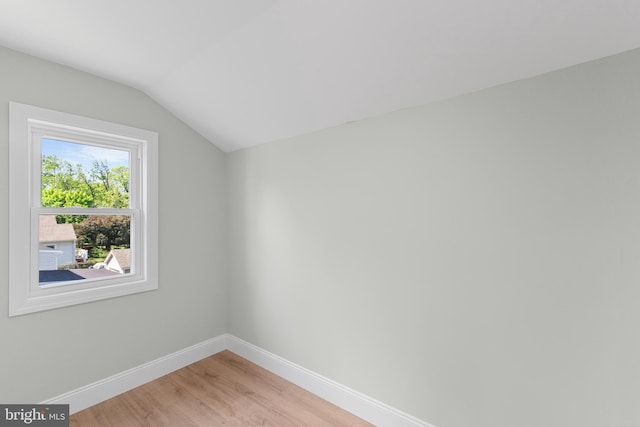 503 W Park Ave, Hamilton, NJ 08610 - unfurnished room featuring baseboards, vaulted ceiling, and light wood finished floors