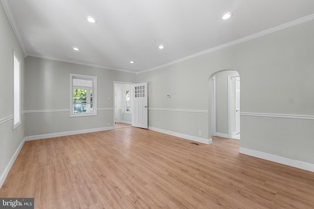 503 W Park Ave, Hamilton, NJ 08610 - empty room with arched walkways, crown molding, light wood-style flooring, baseboards, and recessed lighting
