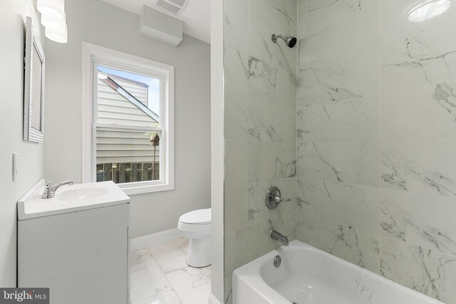 503 W Park Ave, Hamilton, NJ 08610 - bathroom featuring marble finish floors, toilet, vanity, washtub / shower combination, and baseboards
