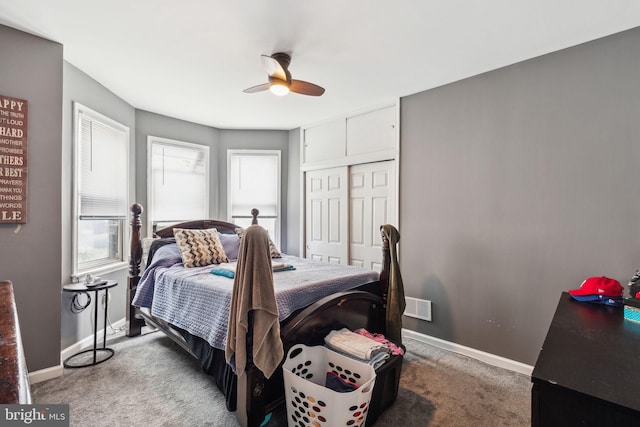 3164 Cedar St, Philadelphia, PA 19134 - bedroom with light carpet, baseboards, a closet, and a ceiling fan