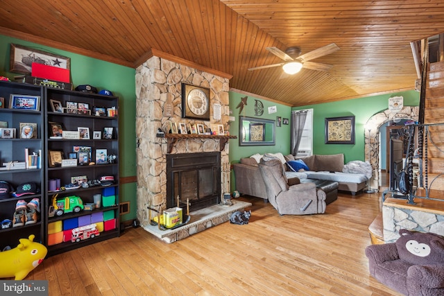 3164 Cedar St, Philadelphia, PA 19134 - living area featuring crown molding, a fireplace, ceiling fan, and hardwood / wood-style flooring