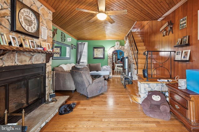 3164 Cedar St, Philadelphia, PA 19134 - living area with wooden ceiling, wooden walls, a ceiling fan, crown molding, and hardwood / wood-style floors