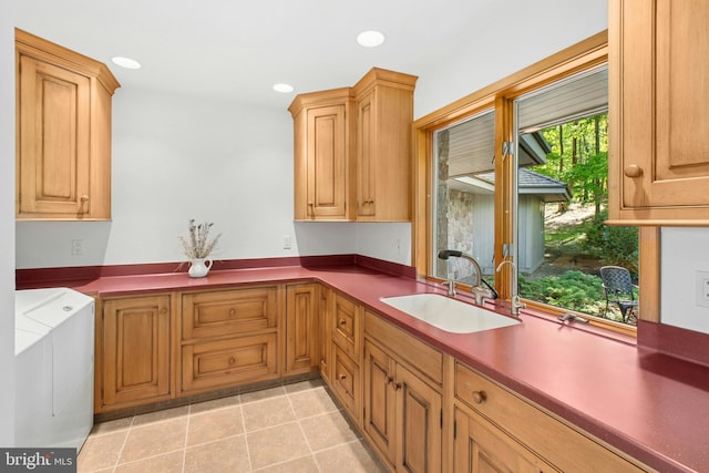 511 Center Hl, Upper Black Eddy, PA 18972 - kitchen featuring a sink, separate washer and dryer, recessed lighting, and light tile patterned flooring