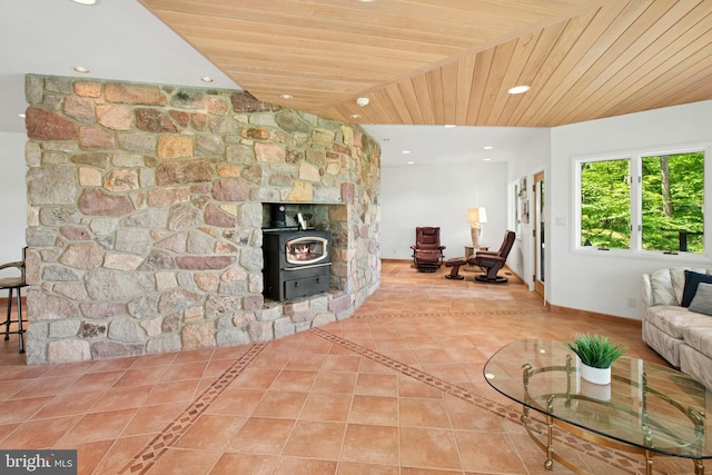 511 Center Hl, Upper Black Eddy, PA 18972 - tiled living area with recessed lighting, wooden ceiling, a wood stove, and baseboards