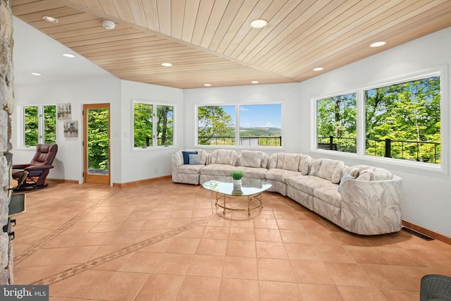511 Center Hl, Upper Black Eddy, PA 18972 - living room featuring healthy amount of natural light, light tile patterned floors, baseboards, and recessed lighting