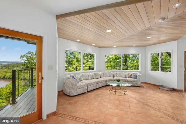 511 Center Hl, Upper Black Eddy, PA 18972 - living area with healthy amount of natural light, light tile patterned floors, baseboards, wood ceiling, and recessed lighting