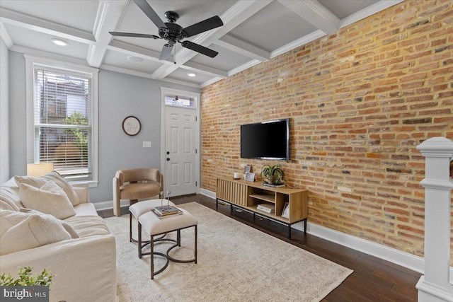 616 Hyson St, Baltimore, MD 21230 - living room featuring dark wood-type flooring, beam ceiling, ceiling fan, coffered ceiling, and brick wall