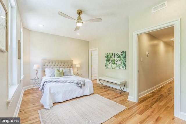 bedroom featuring light wood-style floors, baseboards, a ceiling fan, and recessed lighting