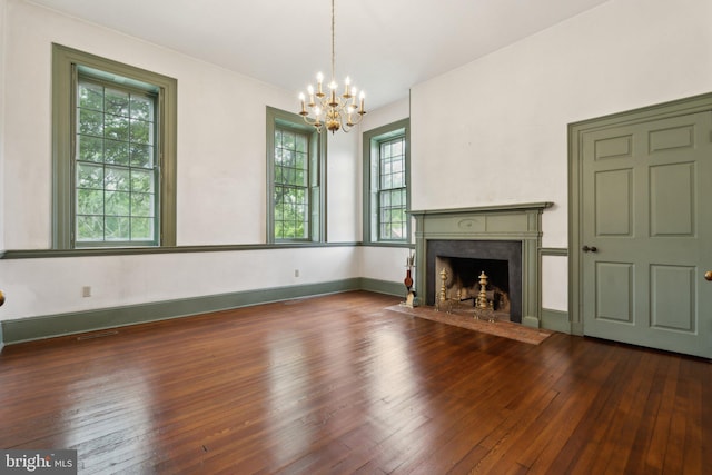 501 Stone Chapel Rd, Westminster, MD 21157 - unfurnished living room with a chandelier, hardwood / wood-style floors, and plenty of natural light