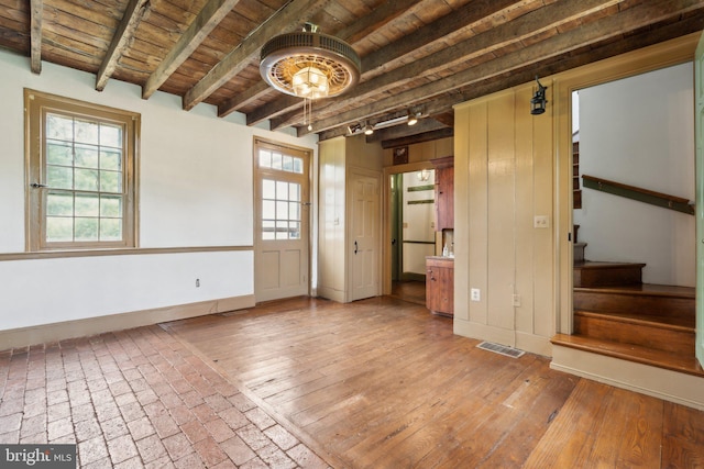 501 Stone Chapel Rd, Westminster, MD 21157 - unfurnished room with wooden ceiling with exposed beams, stairs, baseboards, and rail lighting