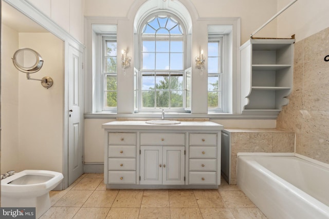 501 Stone Chapel Rd, Westminster, MD 21157 - full bath with a garden tub, vanity, a bidet, and tile patterned flooring