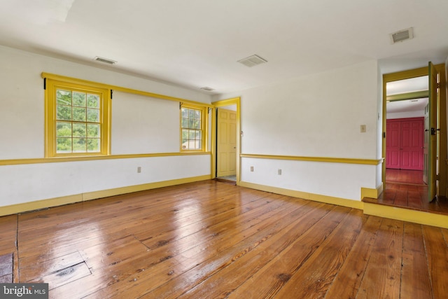 501 Stone Chapel Rd, Westminster, MD 21157 - unfurnished room with healthy amount of natural light, hardwood / wood-style floors, and baseboards