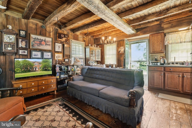 501 Stone Chapel Rd, Westminster, MD 21157 - living area featuring wood ceiling with exposed beams, light wood-style floors, wooden walls, and a chandelier