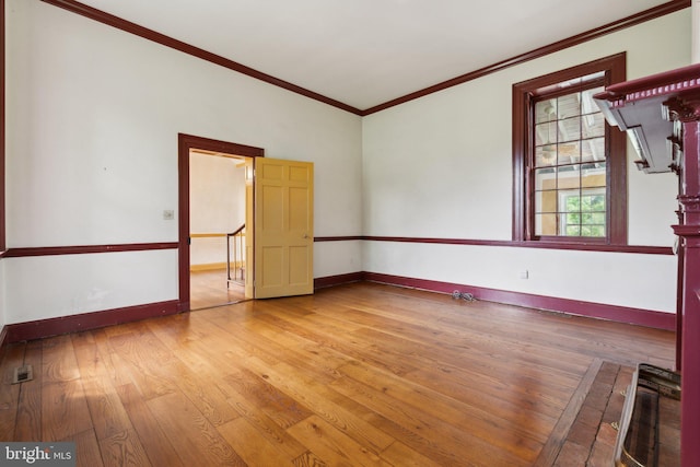 501 Stone Chapel Rd, Westminster, MD 21157 - spare room with ornamental molding, baseboards, and wood finished floors