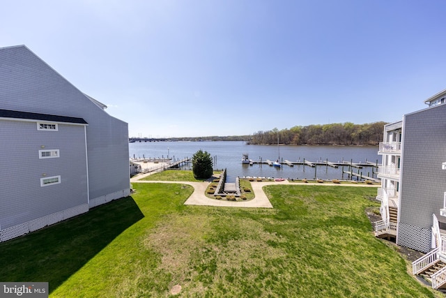33 Owens Landing Ct Unit 33C, Perryville, MD 21903 - view of grassy yard with a water view and a boat dock