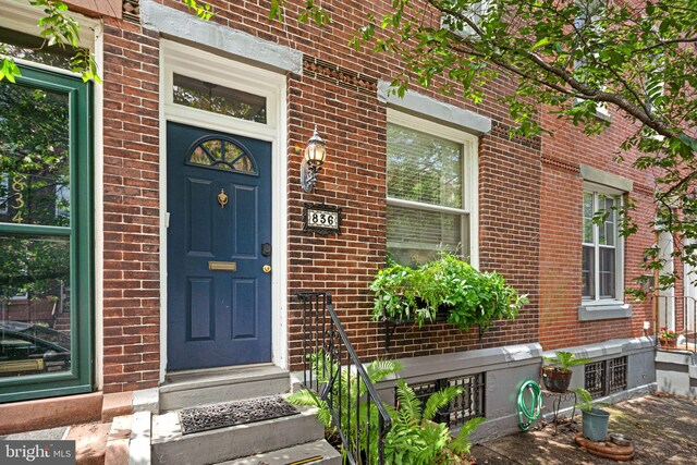 836 N 25th St, Philadelphia, PA 19130 - entrance to property featuring brick siding