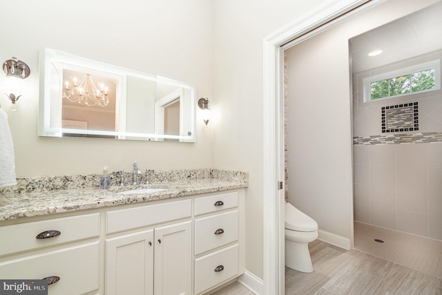 12 Sagecrest Cir, Enola, PA 17025 - full bathroom featuring toilet, vanity, a chandelier, a tile shower, and baseboards
