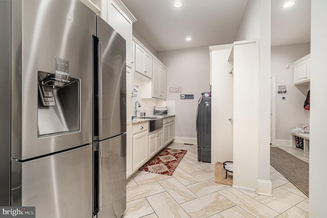 12 Sagecrest Cir, Enola, PA 17025 - kitchen featuring stainless steel fridge with ice dispenser, recessed lighting, white cabinets, washer / clothes dryer, and a sink