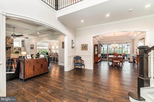 12 Sagecrest Cir, Enola, PA 17025 - living area with arched walkways, a chandelier, ceiling fan, dark wood-type flooring, and crown molding