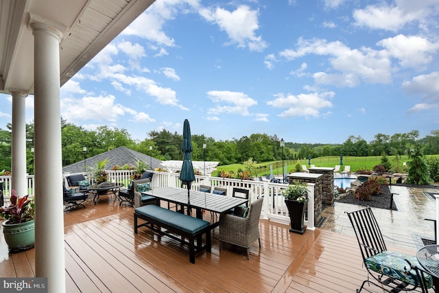 12 Sagecrest Cir, Enola, PA 17025 - wooden deck with outdoor dining space, an outdoor pool, and view of scattered trees