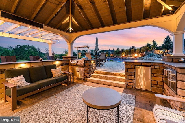 12 Sagecrest Cir, Enola, PA 17025 - patio terrace at dusk featuring a patio area, outdoor lounge area, and a gazebo