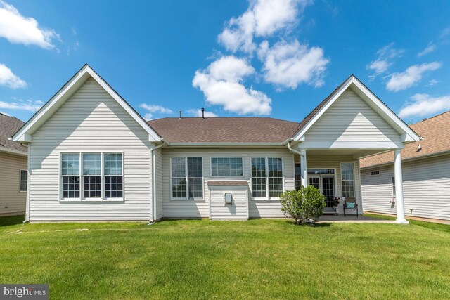 39 Nathaniel, Holland, PA 18966 - rear view of property with a yard, a patio area, and roof with shingles