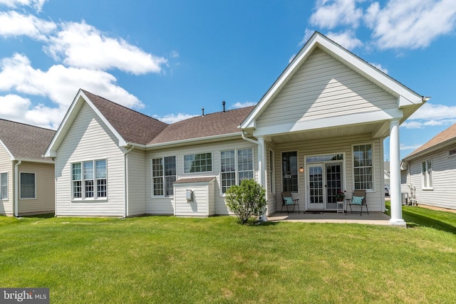 39 Nathaniel, Holland, PA 18966 - rear view of property featuring a yard, a patio area, and a shingled roof