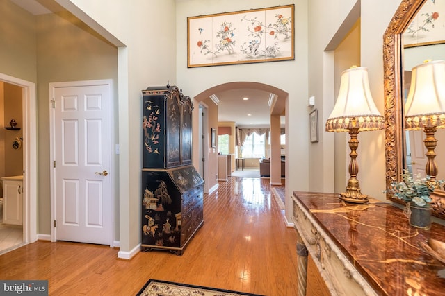 39 Nathaniel, Holland, PA 18966 - entryway featuring arched walkways, wood finished floors, and baseboards