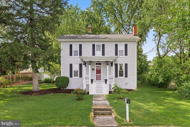 116 W 17th St, Front Royal, VA 22630 - colonial-style house with a chimney and covered porch