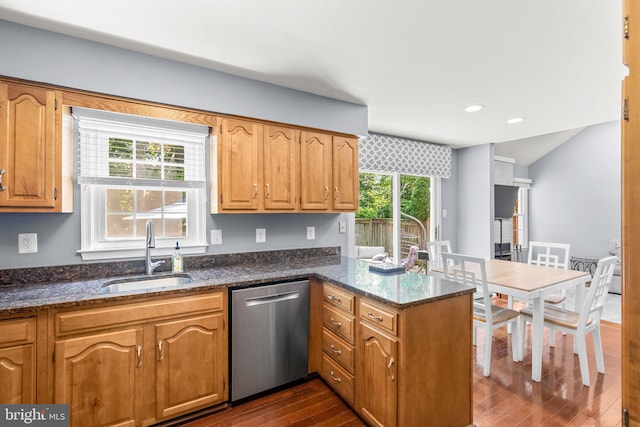 12125 Gatewater Dr, Potomac, MD 20854 - kitchen featuring a sink, stainless steel dishwasher, a peninsula, dark wood-style floors, and dark stone counters